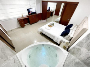 Ecusuites Jacuzzi Executive Dpto Riverfront l puerto santa ana